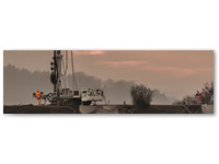 D�senstrahlarbeiten an einem Erddamm